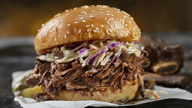 Barbeque shredded beef with cole slaw on hamburger buns