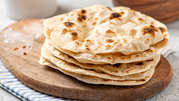 Stack of chapati on a wooden board