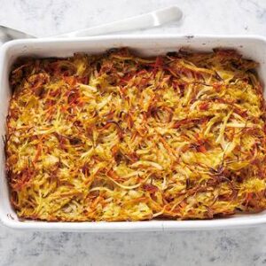 Shredded carrots and potatoes baked with matzo meal and eggs.